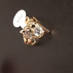 NIB light blue topaz lab created round stone gold plated over silver size 7 ring